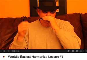 Dan Jones teaches the harmonica